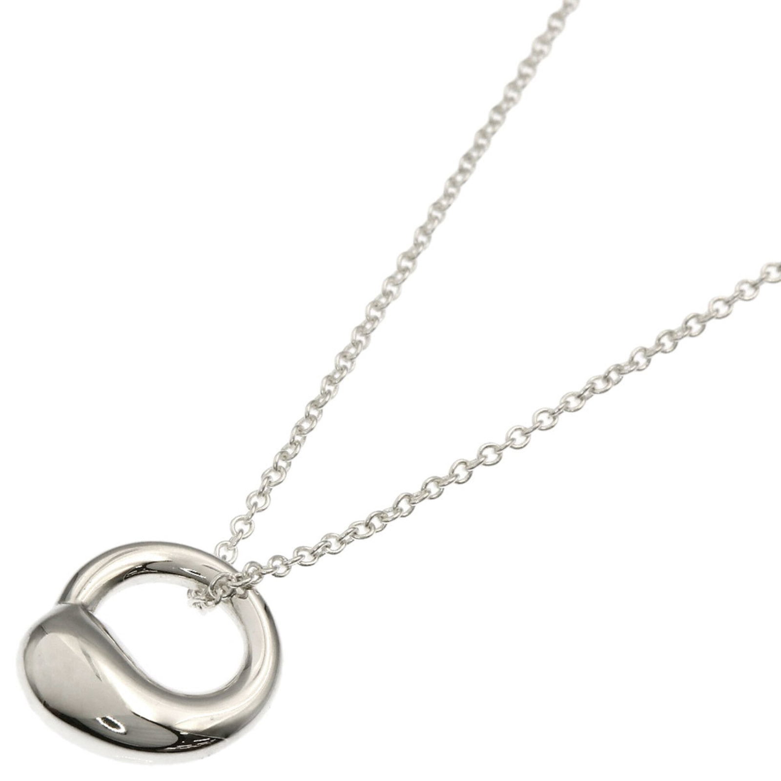 TIFFANY Silver Necklace: TIFFANY Silver Necklace Silver Tiffany Necklace with 13.3mm x 11.1mm Pendant, 43cm Circumference. Gently used with minor signs of wear, this necklace features a 13.3mm x 11.1mm silver pendant. The