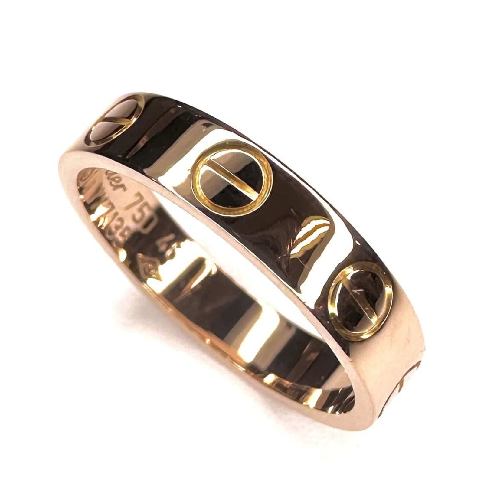CARTIER Band Ring Pink Gold (18K): CARTIER Band Ring Pink Gold (18K) Pink gold (18K) band ring from Cartier, featuring a delicate design in a soft pink hue. Gently used with minor signs of wear, this ring showcases its elegant style