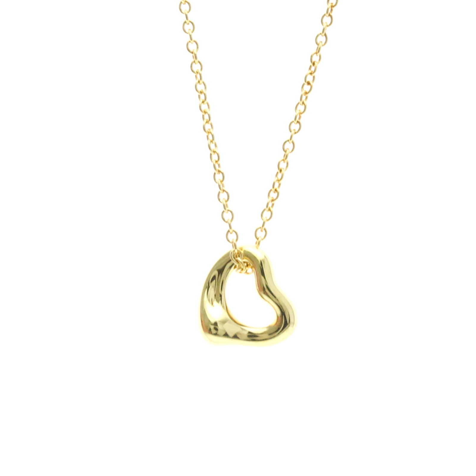 TIFFANY Yellow Gold (18K): TIFFANY Yellow Gold (18K) Yellow gold (18K) pendant necklace from Tiffany's Open Heart collection, featuring a 7mm x 7mm pendant with a 40.5 cm chain. This gently used necklace showcases a subtle, 18K