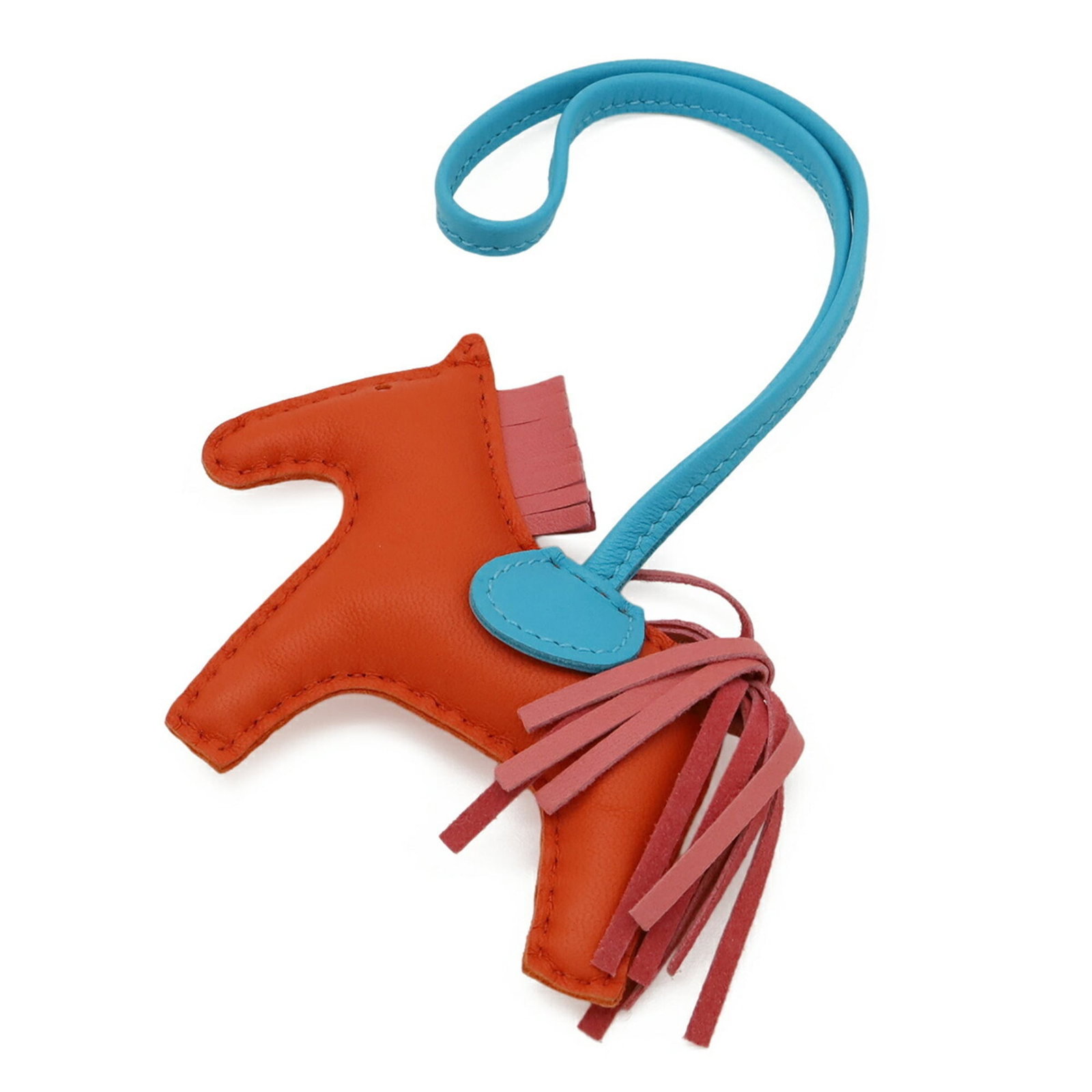 HERMES Handbag Charm Agneau Milo: HERMES Handbag Charm Agneau Milo Agneau Milo is a signature material used by Herm?s, known for its unique blend of natural and synthetic fibers. This handbag charm showcases the distinctive blue and