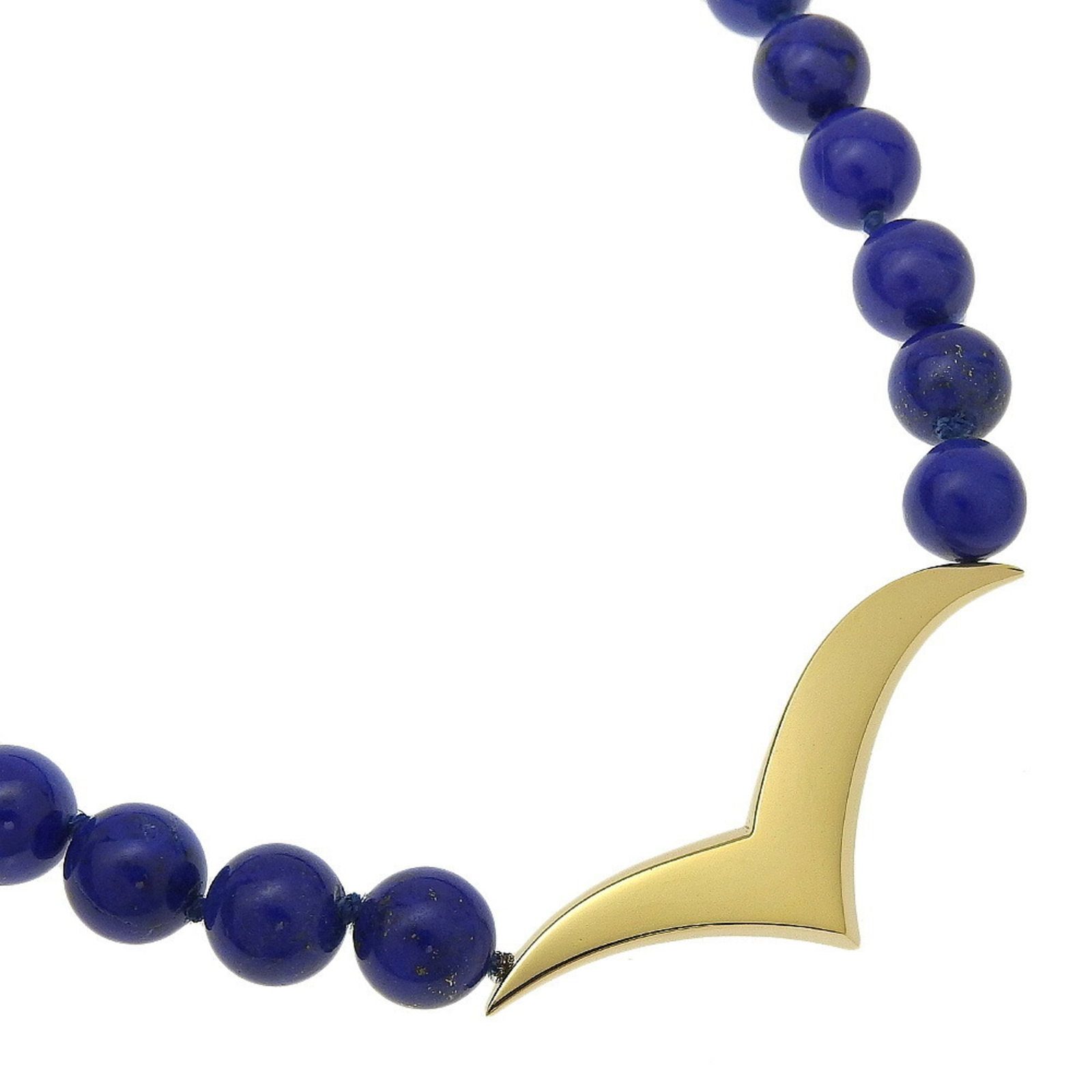 TIFFANY Yellow Gold (18K): TIFFANY Yellow Gold (18K) Yellow gold (18K) necklace with a blue stone of lapis lazuli, crafted by Tiffany, features a 47 cm (18.5") neck circumference. The piece is gently used with minor signs of