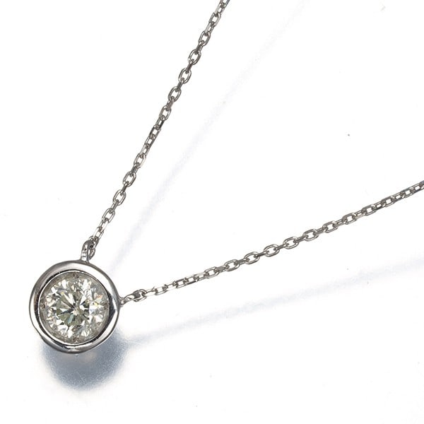 Light Brown Diamond 0.30Ct Bezel Solitaire Necklace 900 850 Platinum: Light Brown Diamond 0.30Ct Bezel Solitaire Necklace 900 850 Platinum Platinum 900/850 solitaire necklace featuring a 0.30ct light brown diamond, set in a sleek bezel design. The necklace boasts a