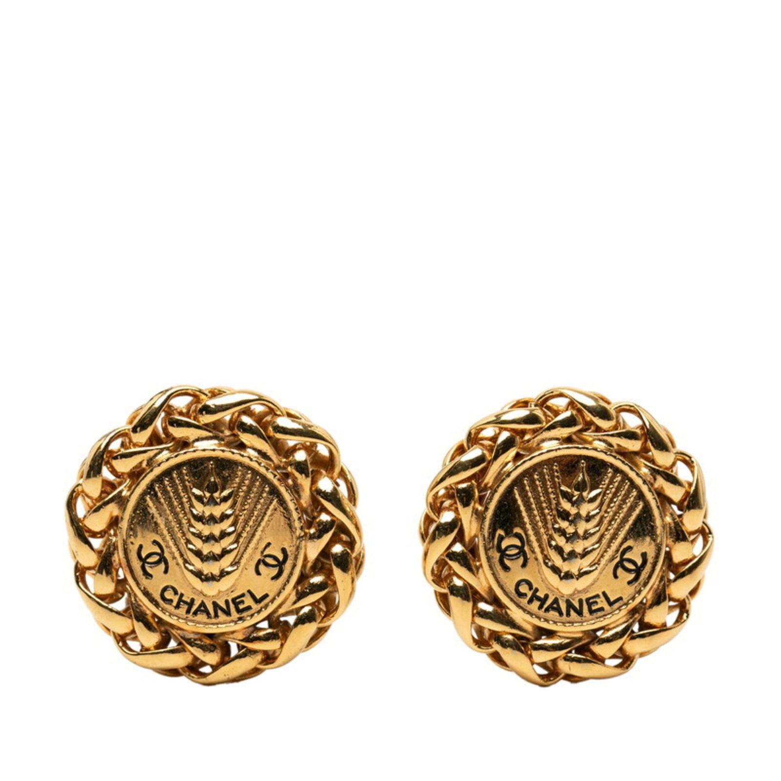 CHANEL Clip Earrings Gold Plating: CHANEL Clip Earrings Gold Plating Gold plating gives these CHANEL Clip Earrings a luxurious touch. The item bears a signature and is made of gold plating, with visible scratches and scuffs from use.