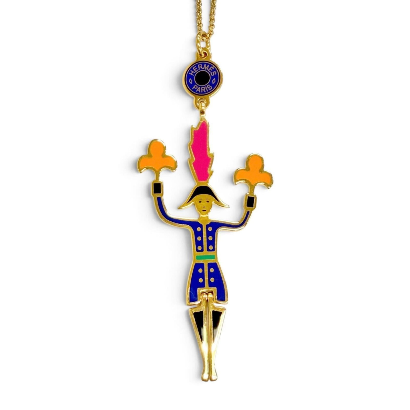 HERMES Gold Multi-Color: HERMES Gold Multi-Color Gold Multi-Color Necklace from Hermes, featuring a 95mm x 33mm pendant in a delicate gold setting, with a 82cm chain circumference. This gently used necklace boasts a
