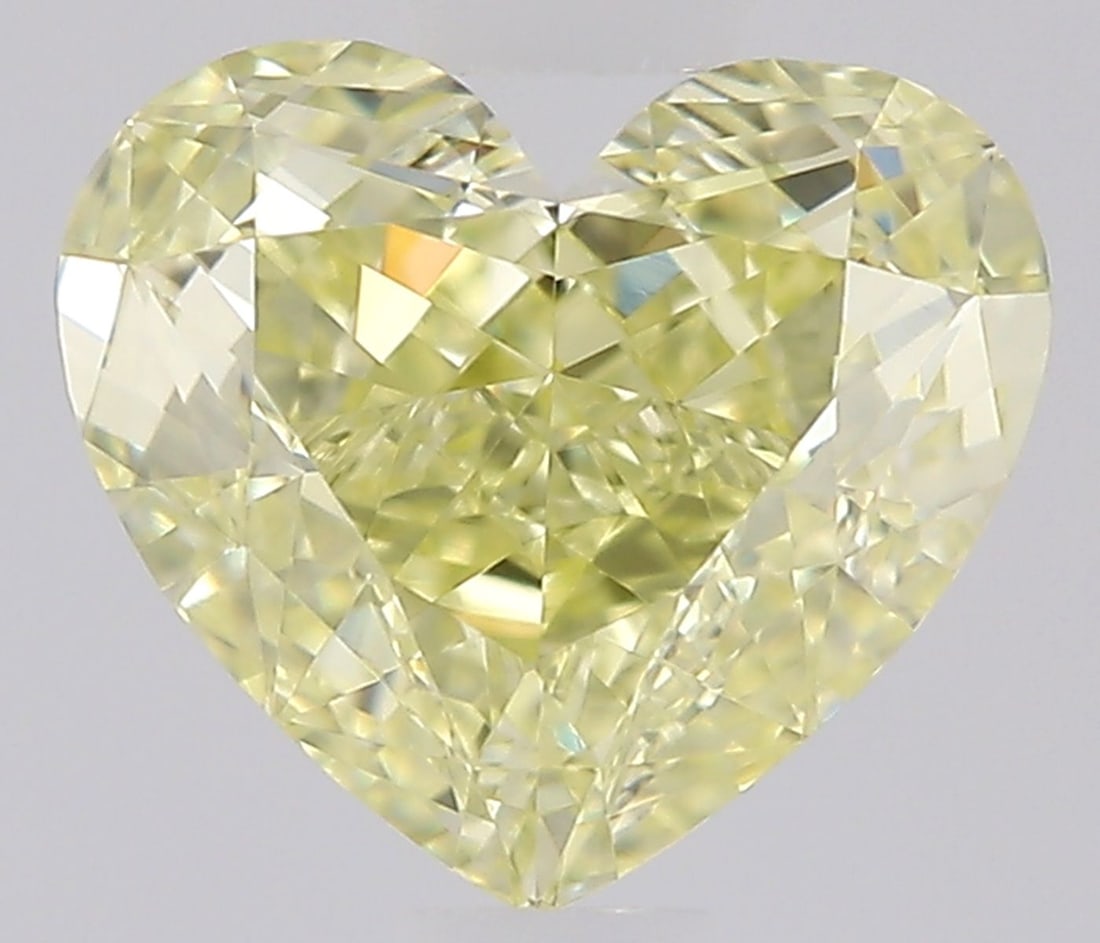 GIA Heart 0.78ct Fancy Yellow IF - Loose Natural Diamond: GIA Heart 0.78ct Fancy Yellow IF - Loose Natural Diamond GIA-certified, this 0.78ct Fancy Yellow IF diamond boasts exceptional clarity and polish, with an EX symmetry. Its vibrant Fancy Yellow color