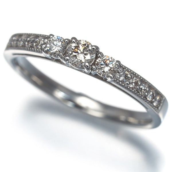Light Brown Diamond 0.30Ct Milgrain Ring 900 Platinum: Light Brown Diamond 0.30Ct Milgrain Ring 900 Platinum The 0.30ct light brown diamond milgrain ring is a stunning piece of jewelry featuring a natural diamond set in 900 platinum. The ring's milgrain d
