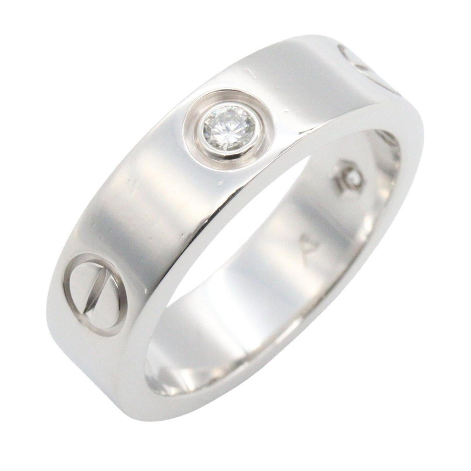 CARTIER Band Ring White Gold (18K): CARTIER Band Ring White Gold (18K) 18K white gold band ring from Cartier, featuring a clear diamond and a classic design. The ring is in very good condition, with minor signs of wear and small scratch