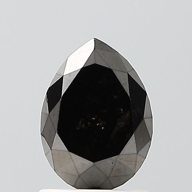 Pear 1.29ct Black VVS2 - Loose Natural Diamond: Pear 1.29ct Black VVS2 - Loose Natural Diamond The 1.29ct Black VVS2 diamond boasts exceptional clarity and polish, with a flawless black color that makes it a standout among other diamonds. Its EX sy