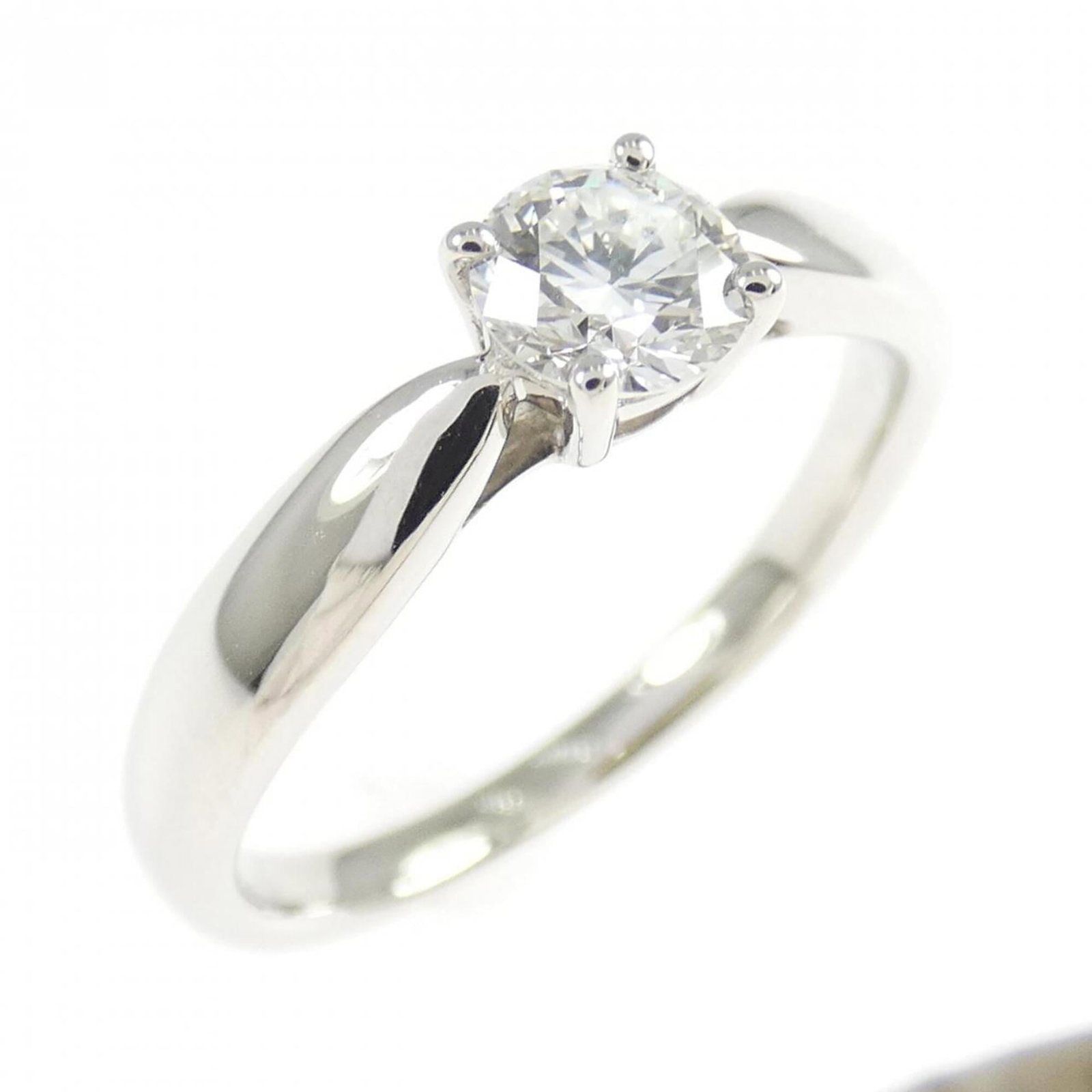 TIFFANY Band Ring Platinum 950: TIFFANY Band Ring Platinum 950 Platinum 950 Tiffany band ring features a diamond stone, setting the standard for luxury jewelry. Gently used with minor signs of wear, this item showcases a Very Good