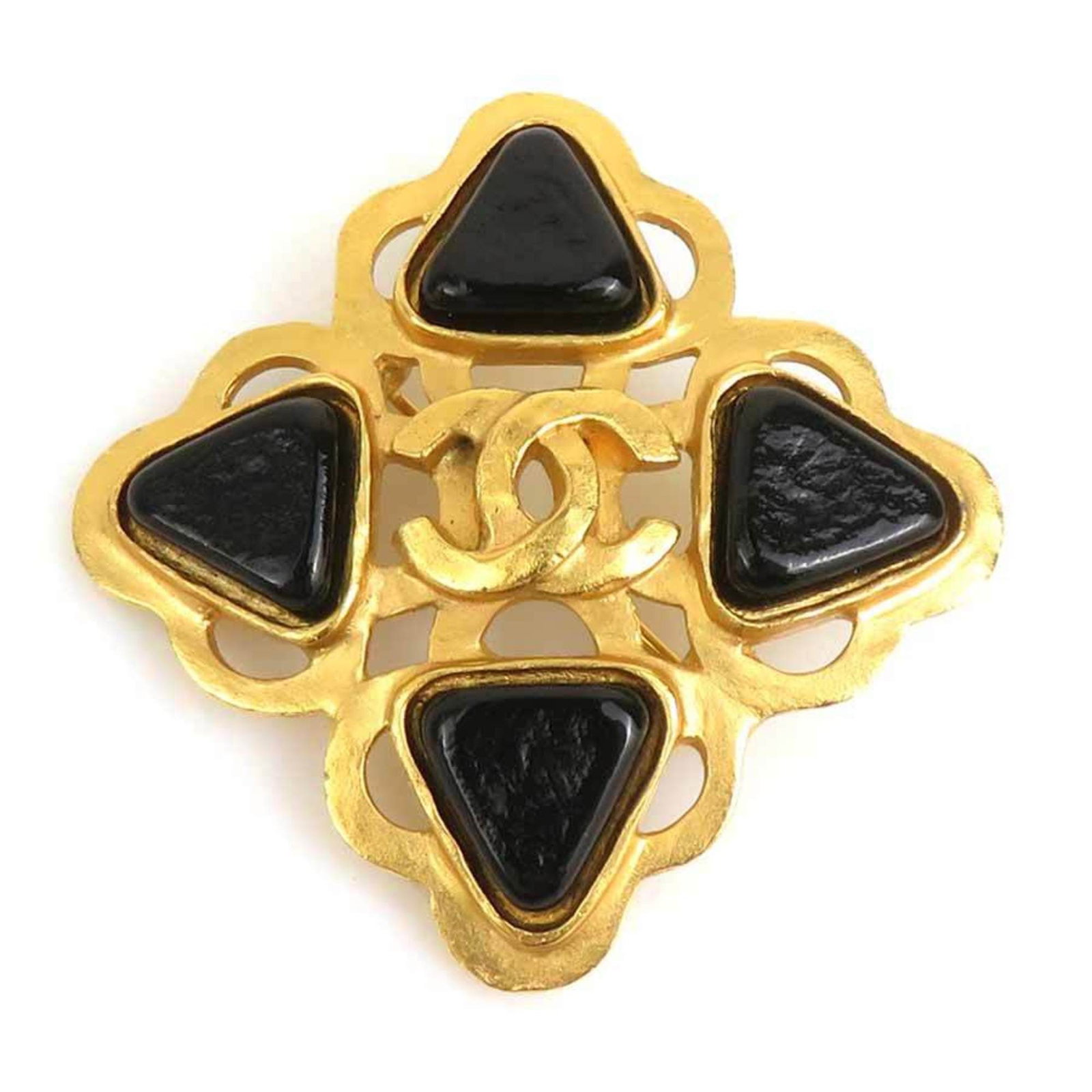 CHANEL Brooch Metal: CHANEL Brooch Metal The CHANEL Brooch Metal is a gold metal brooch featuring a black stone, measuring 4.7cm x 4.7cm. With its visible scratches and scuffs, this piece showcases its worn, used