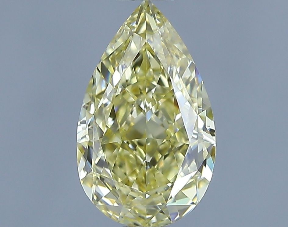GIA Pear 1.17ct Fancy Yellow VVS2 - Loose Natural Diamond: GIA Pear 1.17ct Fancy Yellow VVS2 - Loose Natural Diamond GIA-certified Fancy Yellow 1.17ct VVS2 diamond, showcasing a vibrant yellow hue and exceptional clarity, is a rare natural gem. Its VG polish