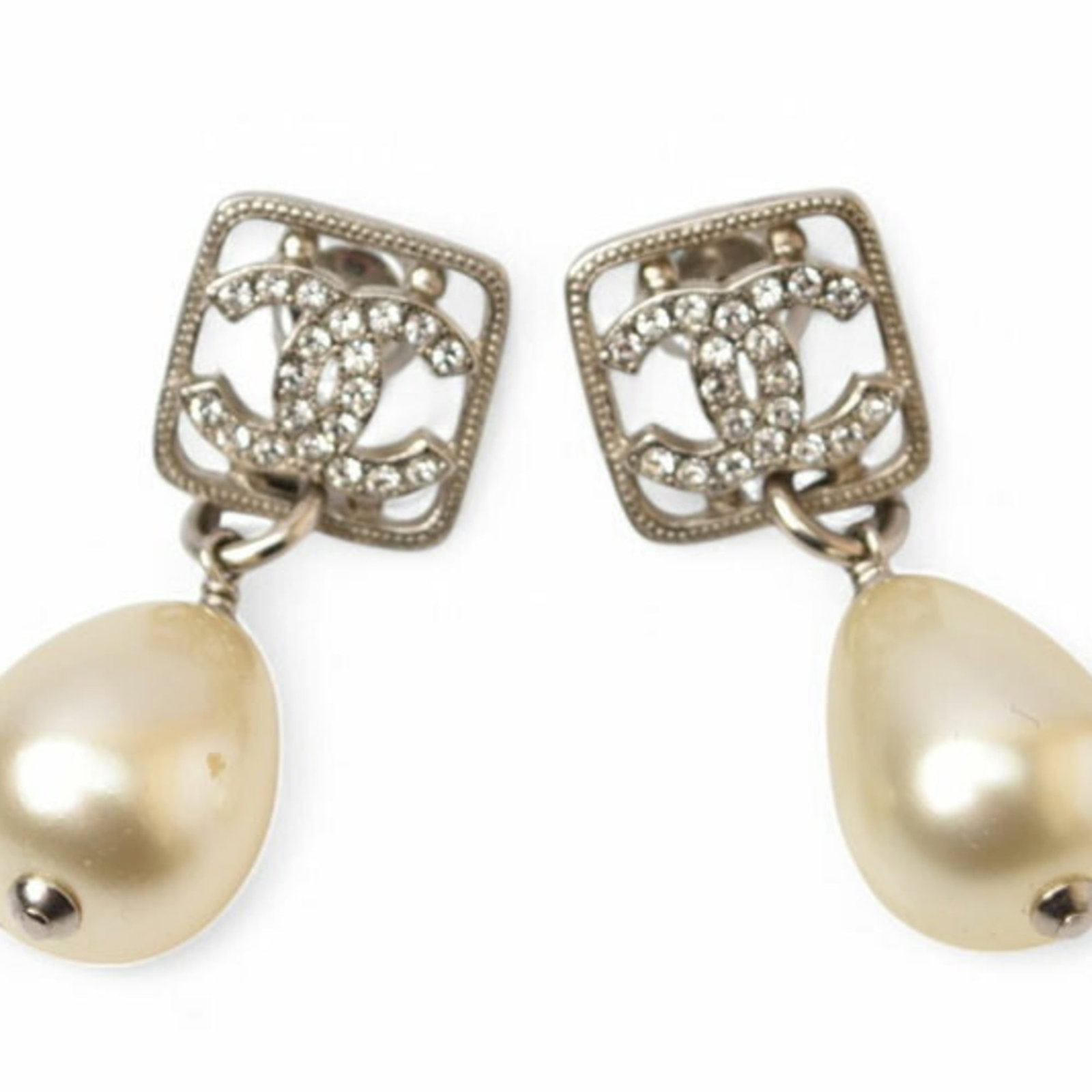 CHANEL Stud Earrings Gold Plating: CHANEL Stud Earrings Gold Plating The CHANEL Stud Earrings Gold Plating are a sophisticated accessory featuring a sleek design with a silver finish. Gently used with minor signs of wear, these