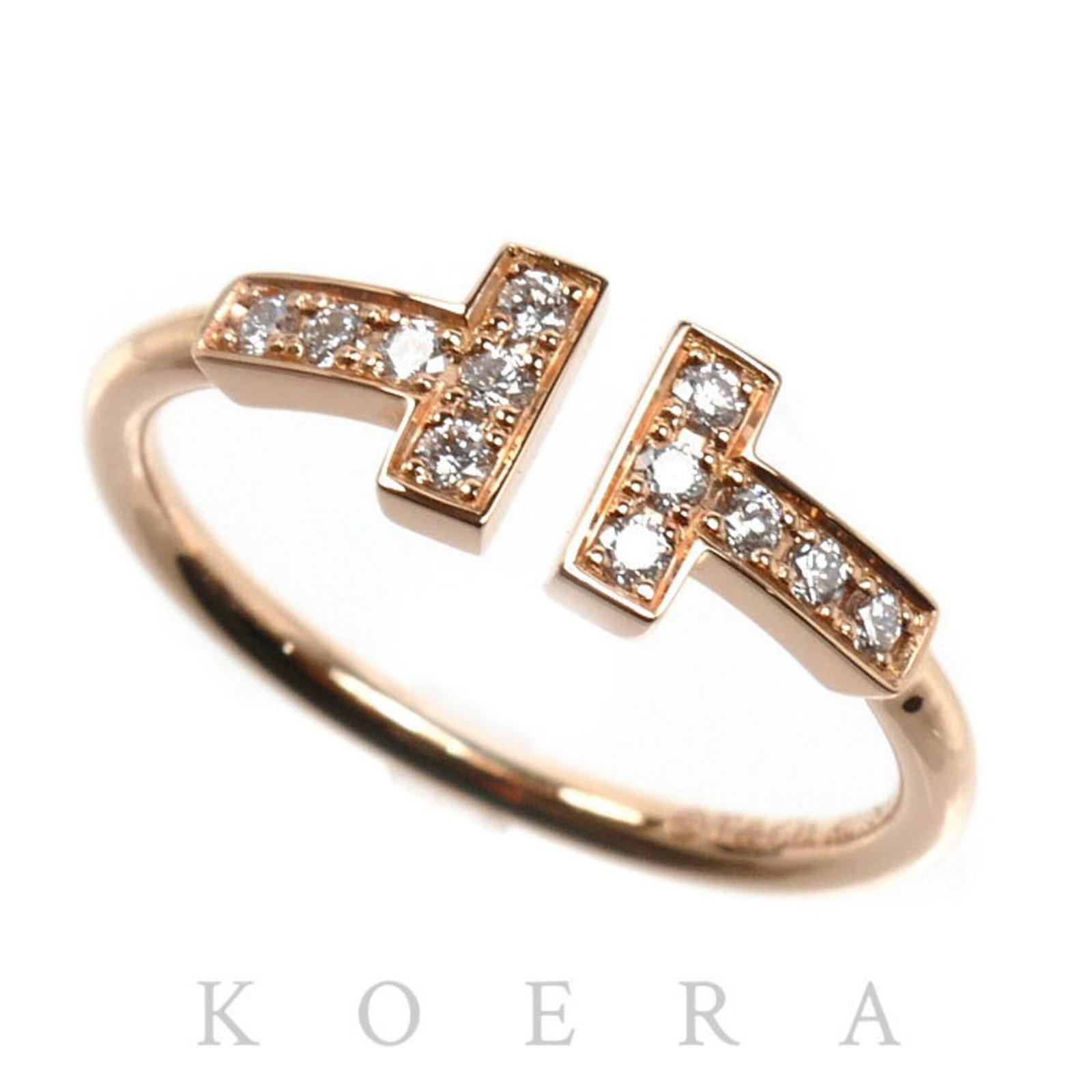TIFFANY Band Ring Pink Gold (18K): TIFFANY Band Ring Pink Gold (18K) Pink gold band ring from Tiffany, featuring a diamond stone, available in a US size 6. This 18K pink gold ring showcases a subtle touch of luxury, with visible wear