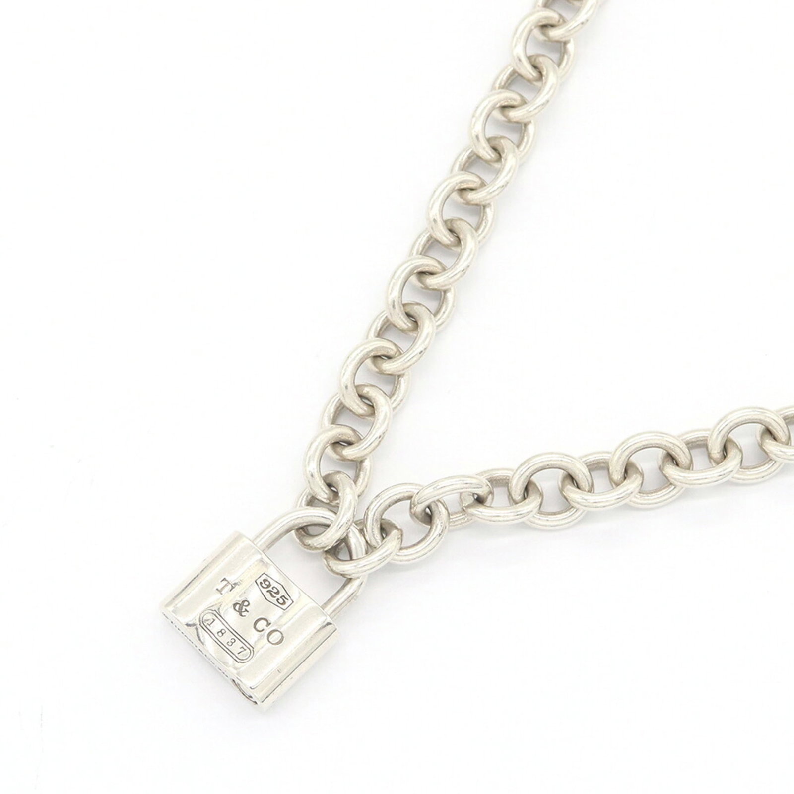 TIFFANY Sterling Silver 925: TIFFANY Sterling Silver 925 Sterling silver 925 pendant from the Tiffany Line 1837 Series, featuring a delicate design. The necklace measures 40 cm in circumference and weighs 44.8g, with a pendant