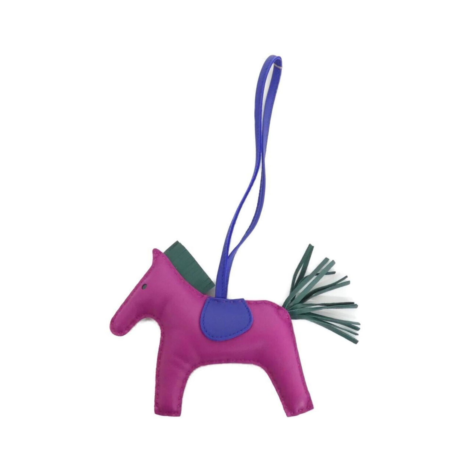 HERMES Handbag Charm Agneau Milo: HERMES Handbag Charm Agneau Milo Agneau Milo Handbag Charm from Hermes features a striking purple hue, adding a pop of color to any handbag. Made from high-quality Agneau Milo material, this charm boa