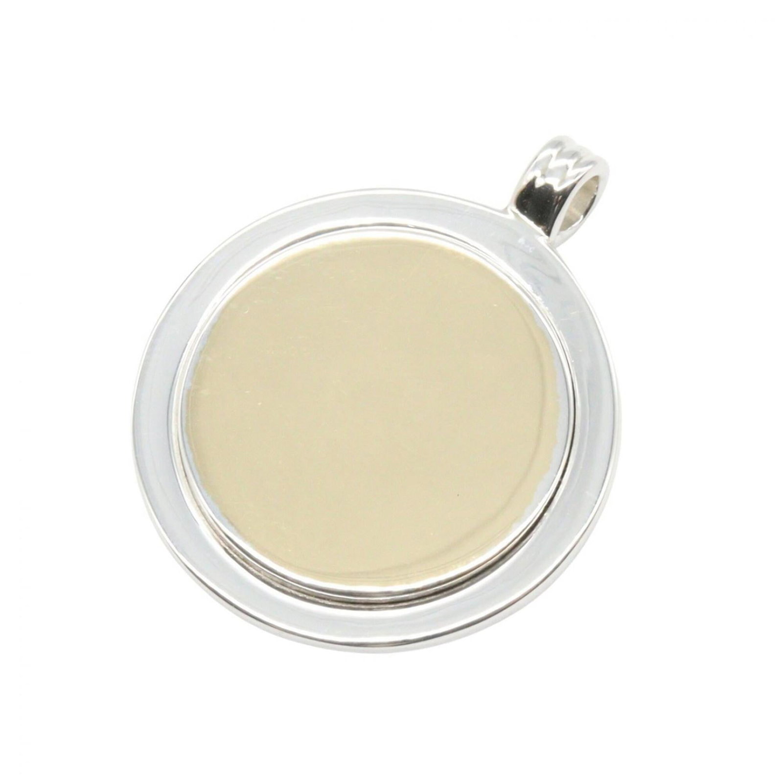 TIFFANY Stainless Steel Yellow Gold (18K): TIFFANY Stainless Steel Yellow Gold (18K) Stainless steel and 18K yellow gold come together in this elegant Tiffany pendant, crafted with a 28mm x 23mm design. The item bears minor signs of wear, with