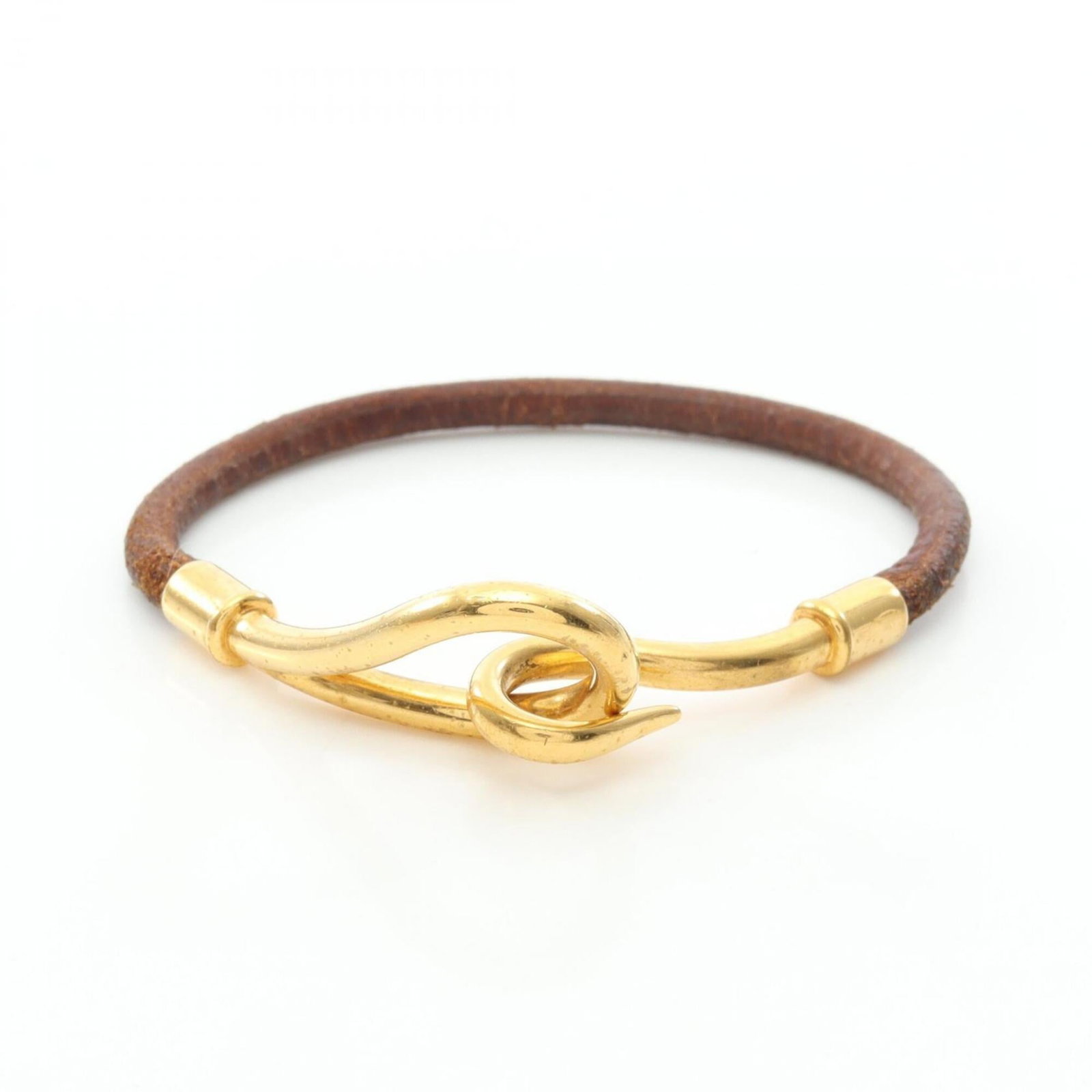 HERMES Charm Bracelet Gold Plating Leather: HERMES Charm Bracelet Gold Plating Leather Gold plating and supple brown leather come together in a classic charm bracelet from Hermes, a timeless design that adds a touch of sophistication to any