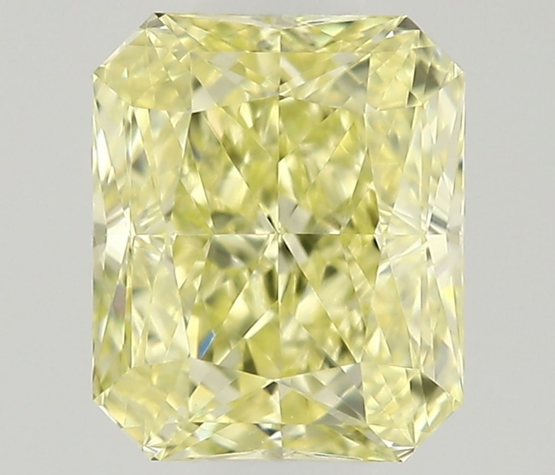 Radiant 0.42ct Fancy Yellow VVS1 - Loose Natural Diamond: Radiant 0.42ct Fancy Yellow VVS1 - Loose Natural Diamond 0.42ct Fancy Yellow VVS1 - Loose Natural Diamond. This loose natural diamond boasts a vibrant Fancy Yellow color and exceptional clarity, with