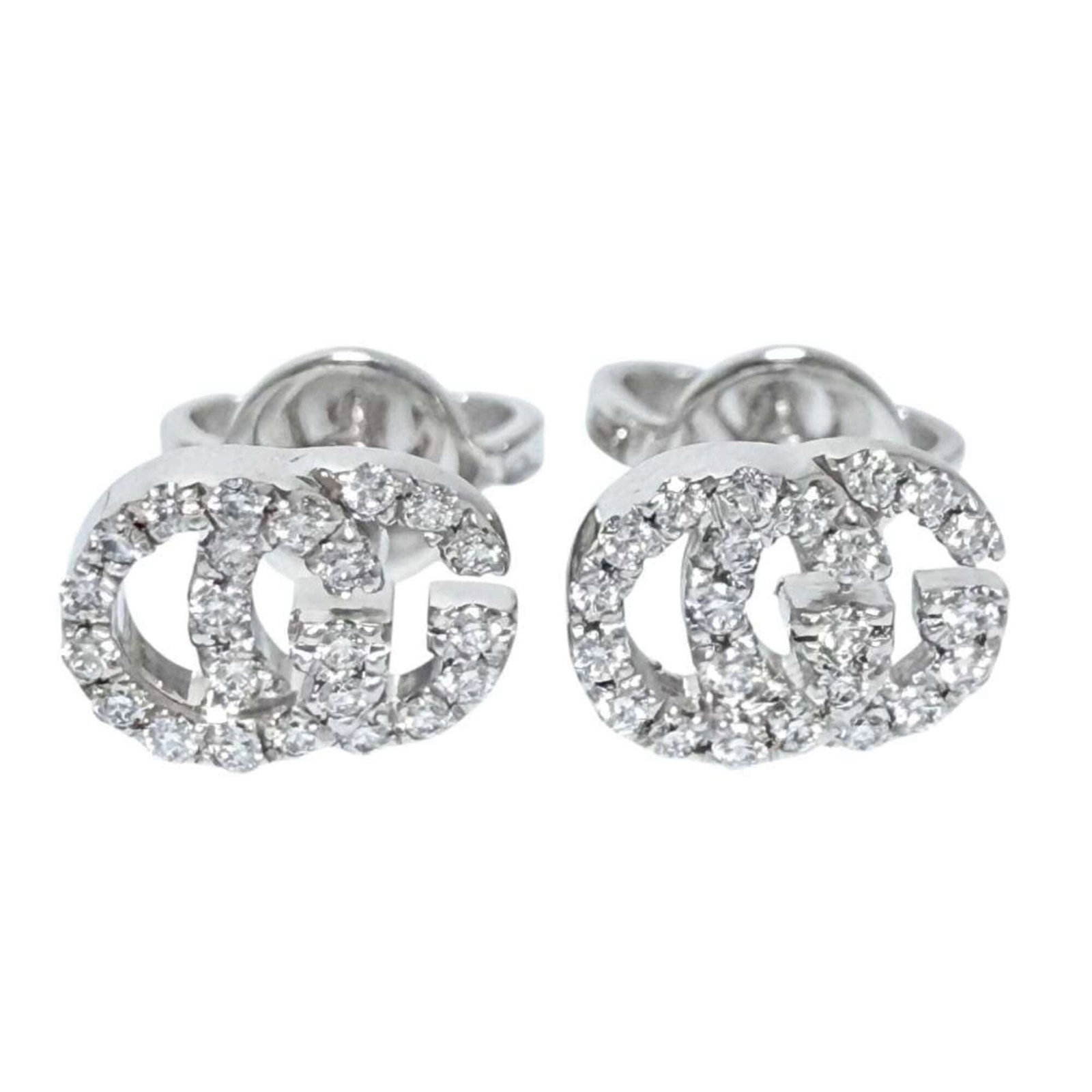 GUCCI Stud Earrings White Gold (18K): GUCCI Stud Earrings White Gold (18K) Stud earrings in white gold (18K) feature a sleek design. Made by Gucci, these earrings are crafted from high-quality white gold and have a size of 5.00mm x 7.00mm