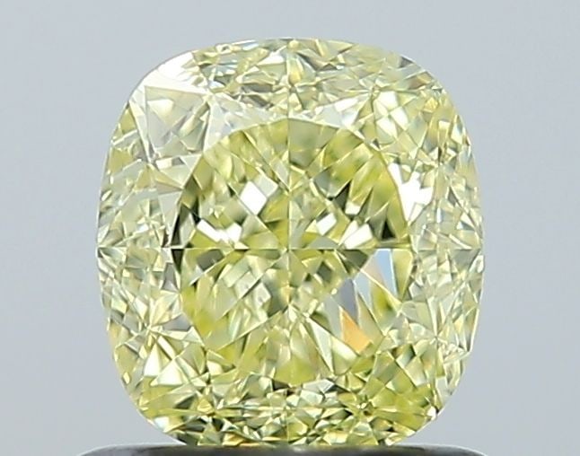 GIA Cushion Modified 1.0ct Fancy Yellow VVS1 - Loose Natural Diamond: GIA Cushion Modified 1.0ct Fancy Yellow VVS1 - Loose Natural Diamond GIA certified 1.0ct Fancy Yellow VVS1 diamond, boasting EX polish and VG symmetry, showcases exceptional clarity and color. This