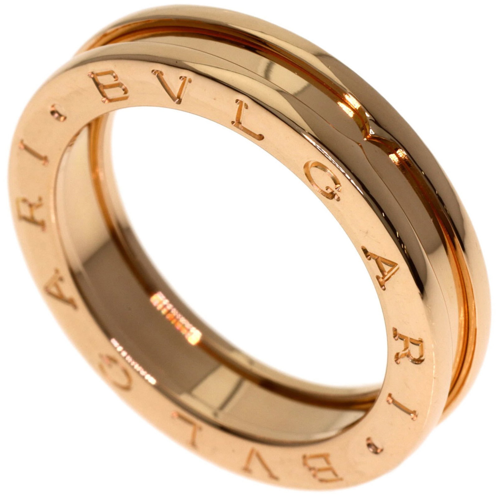 BVLGARI Band Ring Pink Gold (18K): BVLGARI Band Ring Pink Gold (18K) Pink gold (18K) BVLGARI Band Ring in Very Good Condition. This gently used band ring features the iconic BVLGARI design in pink gold, with minor scratches or light ma