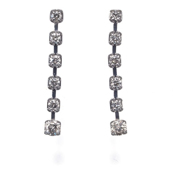 Diamond 0.15Ct/0.15Ct 6P Station Drop Earrings 18K Wg/14K Wg: Diamond 0.15Ct/0.15Ct 6P Station Drop Earrings 18K Wg/14K Wg Drop earrings featuring two 0.15ct natural diamonds in a 19.2 x 2.5mm design, set in 18k white gold. The earrings showcase a classic drop s