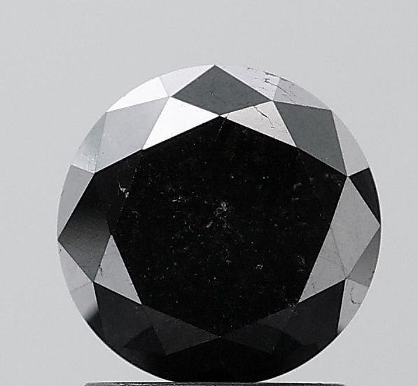 Round 1.93ct Black VVS2 - Loose Natural Diamond: Round 1.93ct Black VVS2 - Loose Natural Diamond Round 1.93ct Black VVS2 - Loose Natural Diamond. This exquisite black diamond boasts exceptional clarity, cut, and polish, making it a true standout