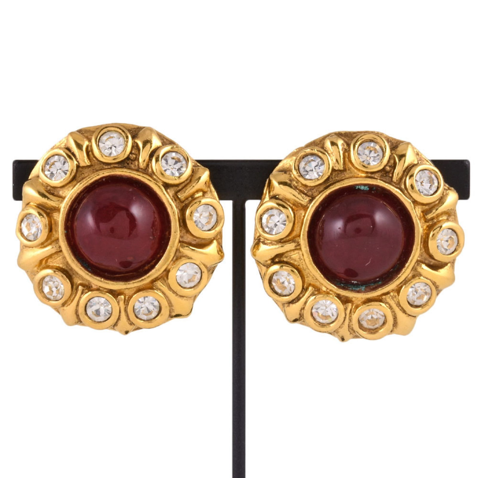 CHANEL Clip Earrings Gold Plating: CHANEL Clip Earrings Gold Plating Gold plated Clip earrings from CHANEL, featuring a clear and red color stone set in a 30mm diameter frame. The earrings showcase a subtle gold plating finish and have