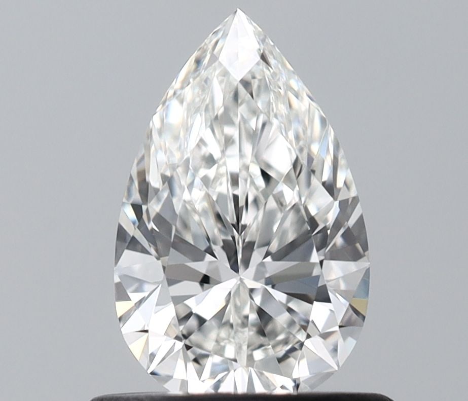 GIA Pear 0.63ct G VVS1 - Loose Natural Diamond: GIA Pear 0.63ct G VVS1 - Loose Natural Diamond GIA certified 0.63ct G VVS1 pear-cut diamond with exceptional clarity, polish, and symmetry, showcasing its natural beauty in a loose state. This