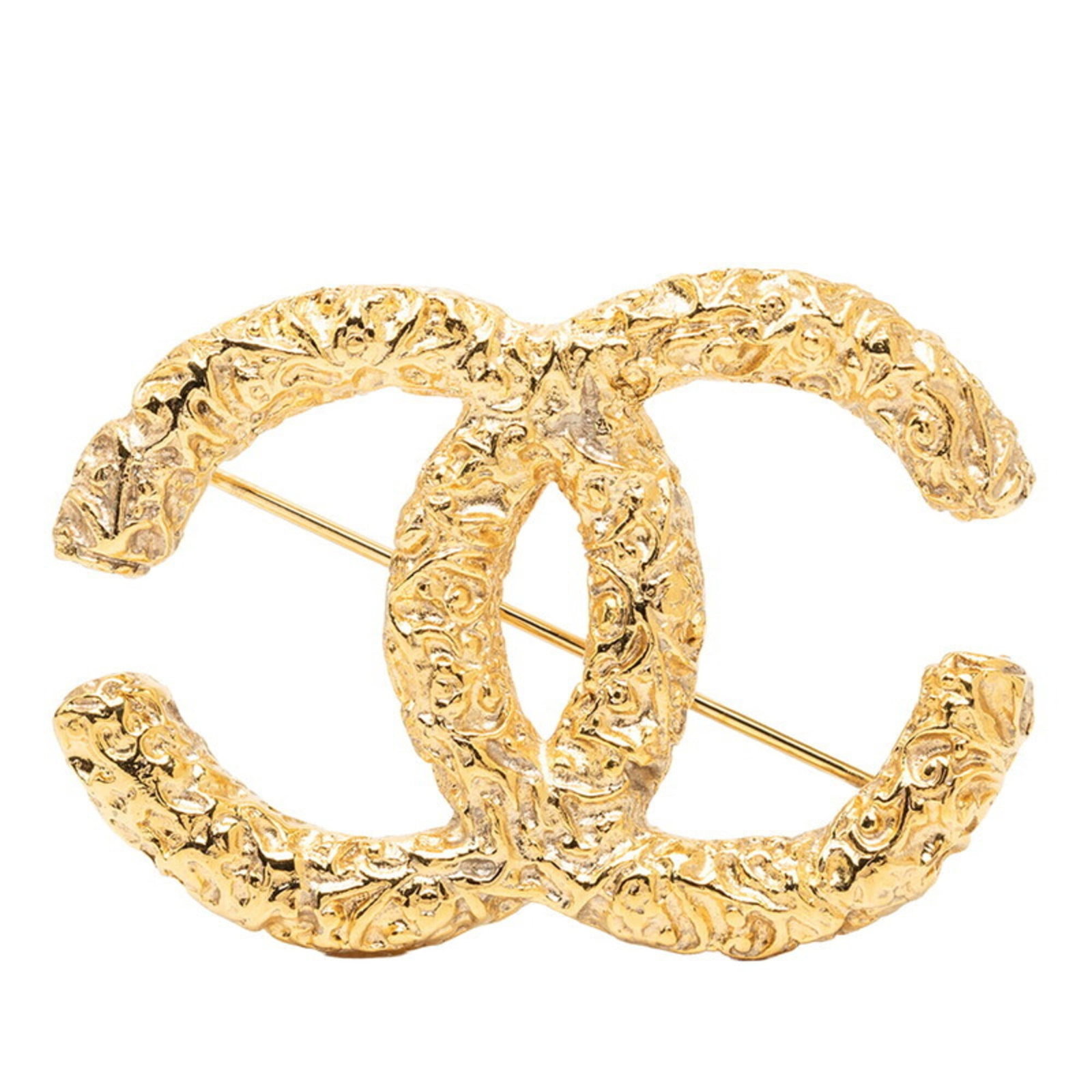 CHANEL Brooch Gold Plating: CHANEL Brooch Gold Plating Gold plating adds a touch of luxury to this CHANEL brooch, a stylish accessory for women. With visible scratches and scuffs, this brooch bears the signs of wear and use, but