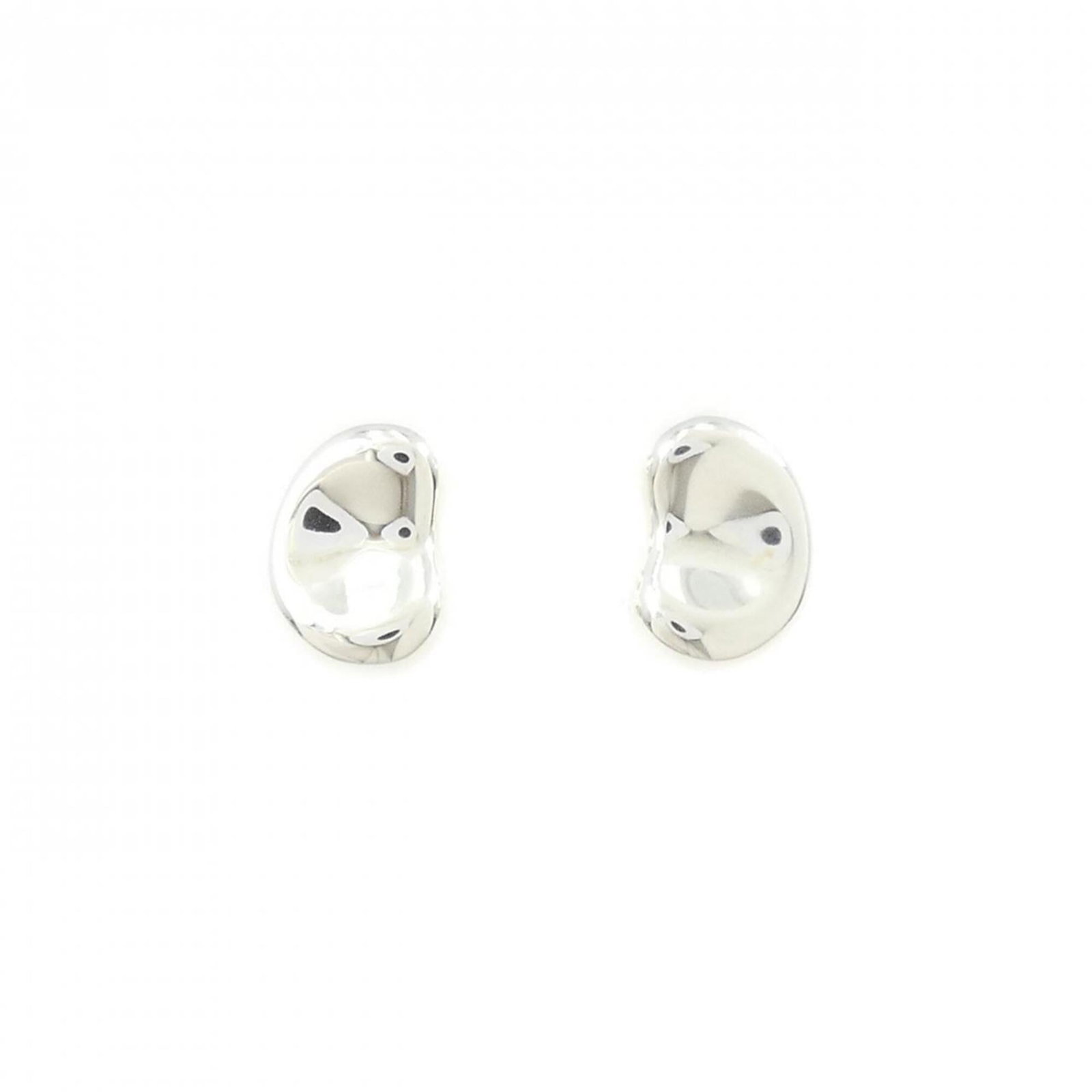 TIFFANY Stud Earrings Silver 925: TIFFANY Stud Earrings Silver 925 Silver 925 stud earrings from Tiffany, bearing a signature, are available in a very good condition with minor signs of wear. The earrings feature a delicate design