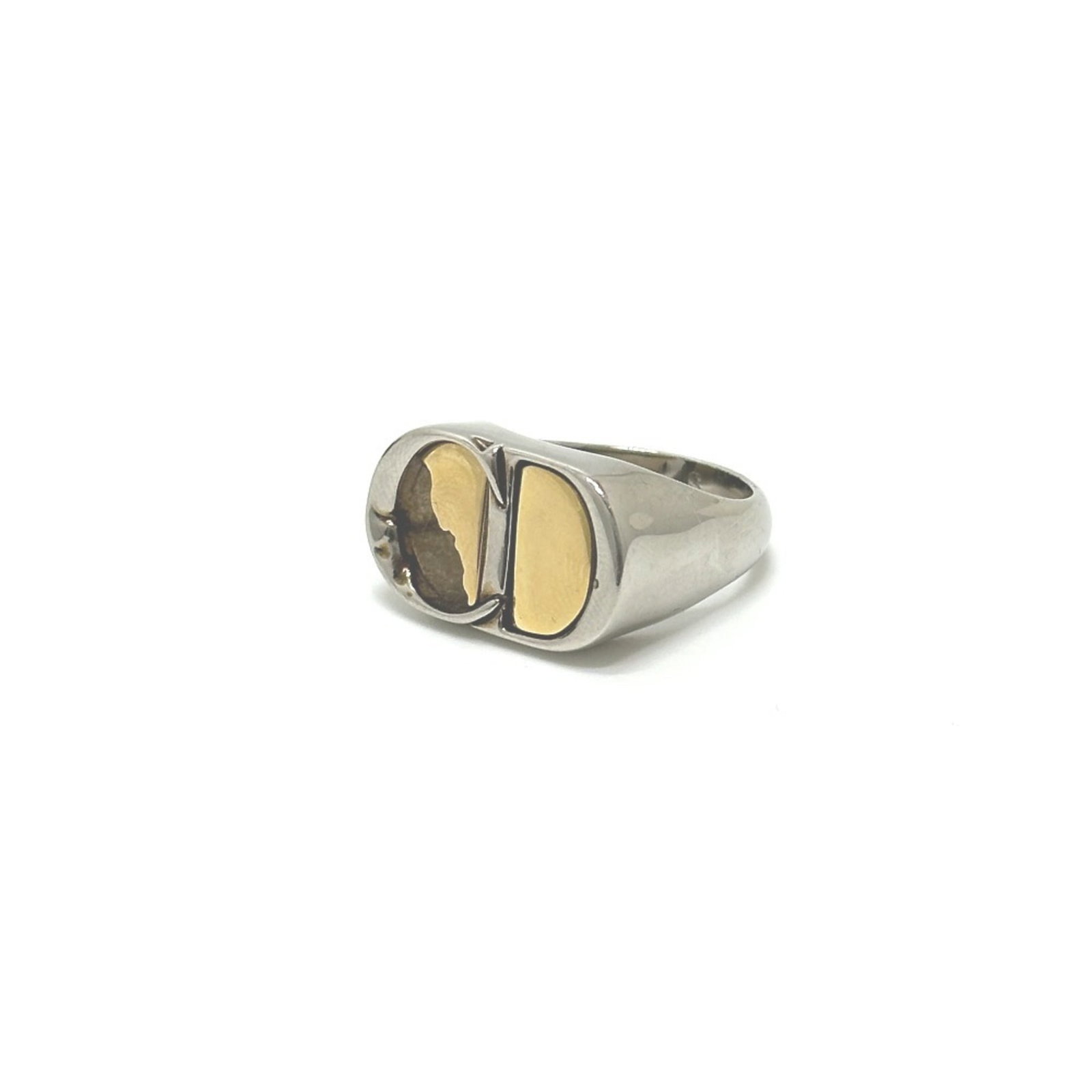 CHRISTIAN DIOR Band Ring Metal: CHRISTIAN DIOR Band Ring Metal Silver band ring from Christian Dior featuring a metal design. This fashion band ring is made of metal and has visible wear, including scratches and scuffs, but remains 