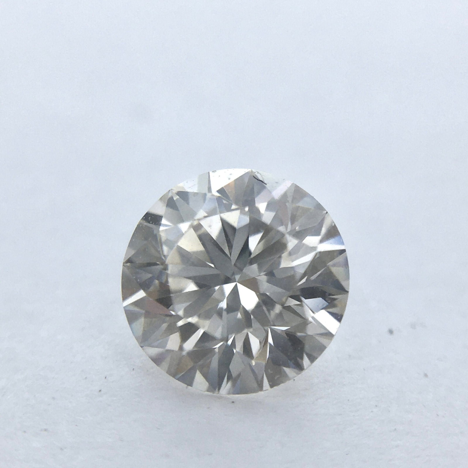 GIA Round 0.57ct J VVS1 - Loose Natural Diamond: GIA Round 0.57ct J VVS1 - Loose Natural Diamond GIA certified, this 0.57ct J VVS1 round diamond boasts exceptional clarity and color, with EX polish and symmetry. Measuring 5.31L x 5.33W x 3.28H, its 
