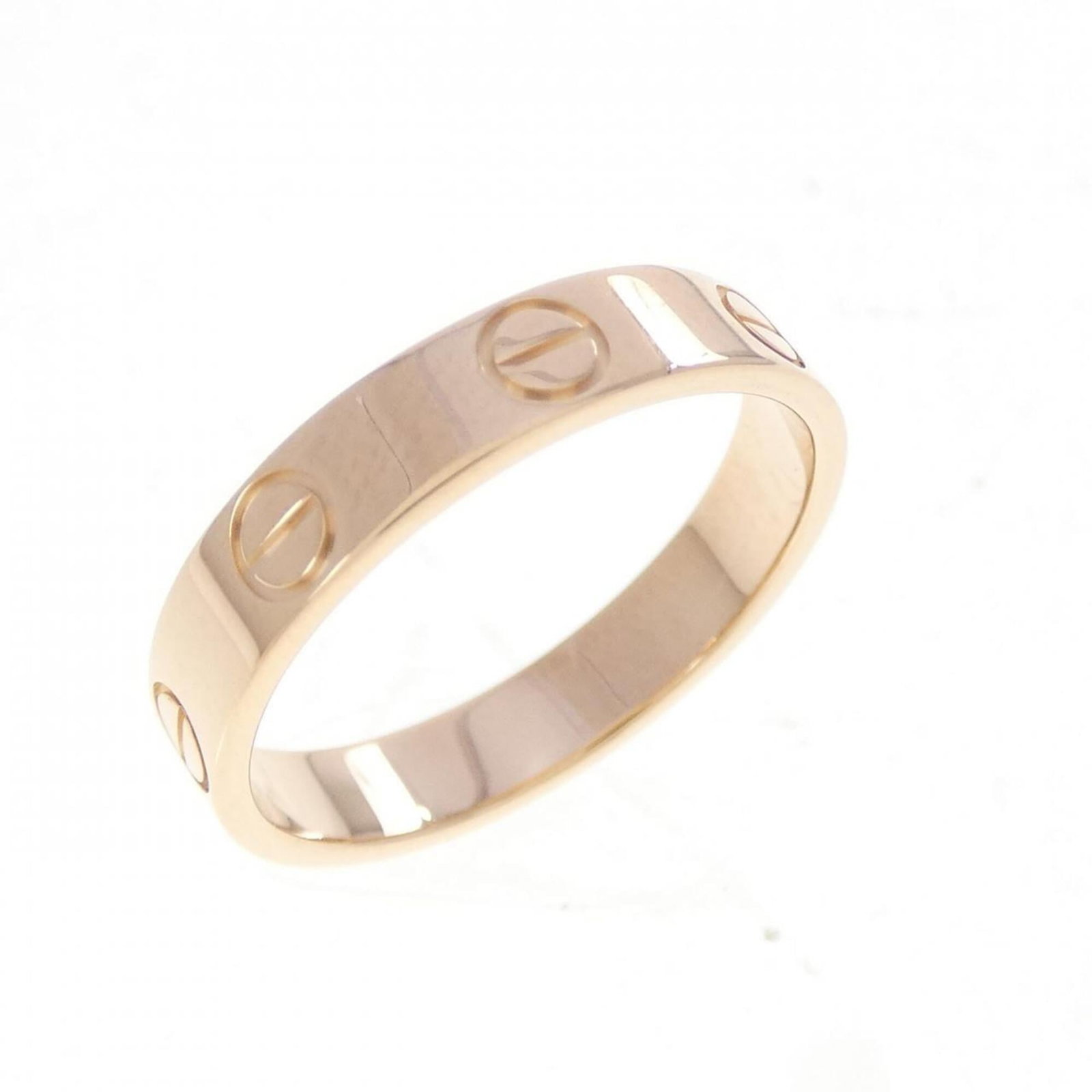 CARTIER Band Ring Pink Gold (18K): CARTIER Band Ring Pink Gold (18K) Pink gold (18K) Cartier band ring with a delicate design, available in a 51 US size, suitable for women. The ring features a subtle pink gold finish and minor signs o