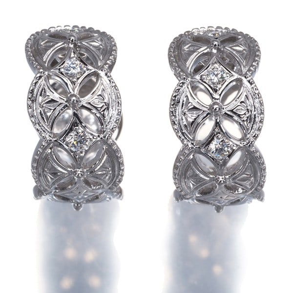 Mikimoto Earrings Diamond 0.05Ct/0.05Ct Openwork 18K 750 White Gold: Mikimoto Earrings Diamond 0.05Ct/0.05Ct Openwork 18K 750 White Gold Clip-on or screw-on 18K white gold earrings featuring two 0.05ct natural diamonds, set in an openwork design, adding a touch of eleg