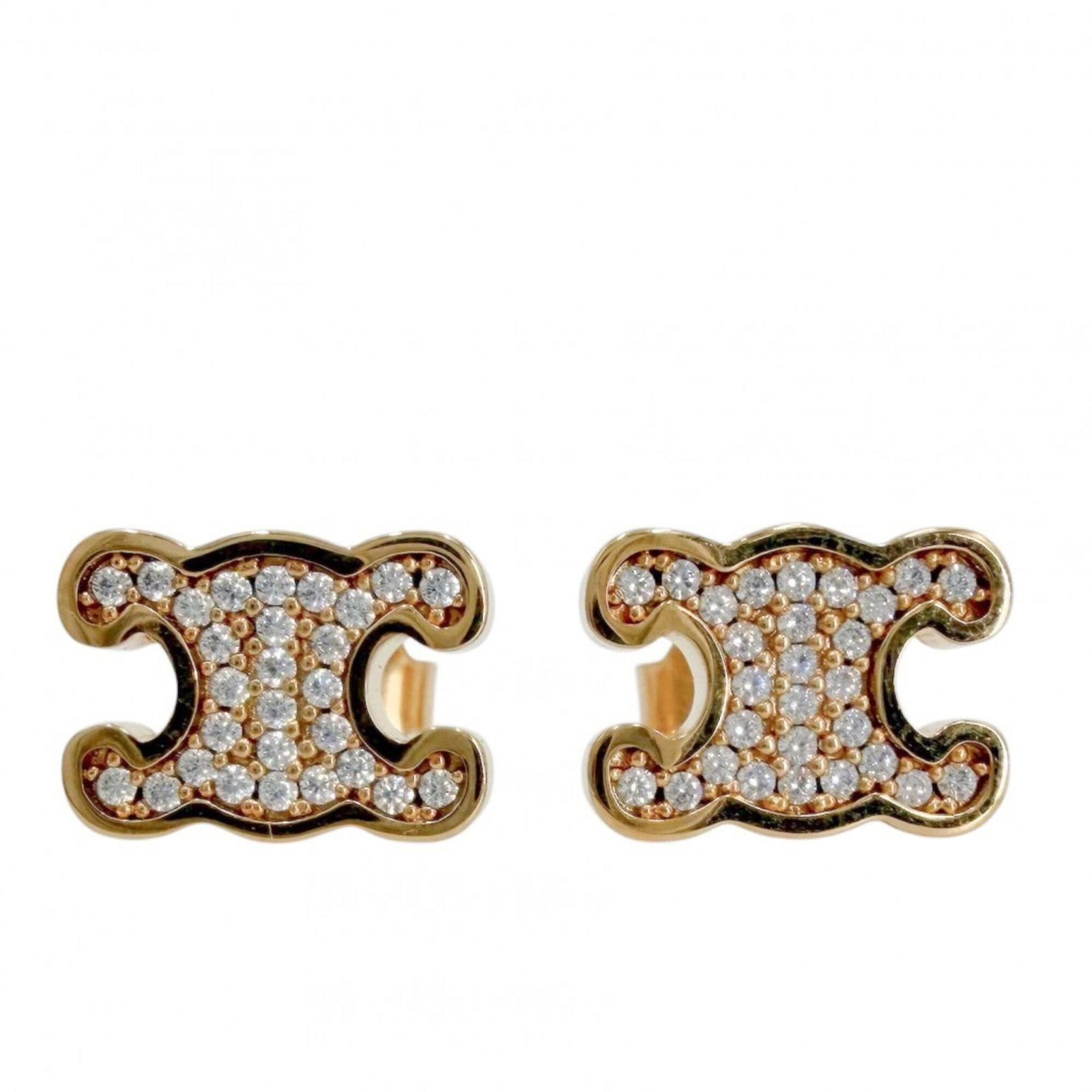 CELINE Stud Earrings Gold: CELINE Stud Earrings Gold Gold stud earrings from Celine, featuring rhinestone accents, measuring 8.00mm x 11.00mm. Gently used with minor signs of wear, these earrings are in very good condition.