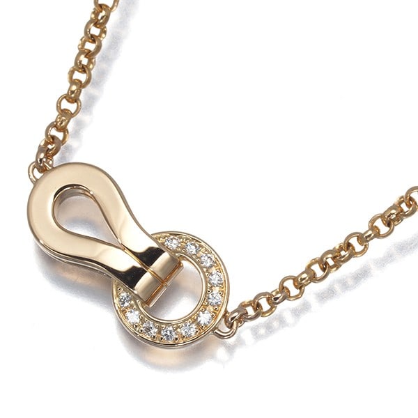 Cartier Necklace Diamond Agrafe 18K 750 Rose Gold: Cartier Necklace Diamond Agrafe 18K 750 Rose Gold Cartier's 18K rose gold Agrafe necklace showcases a stunning natural diamond pendant, expertly crafted in the iconic Agrafe style. The necklace's