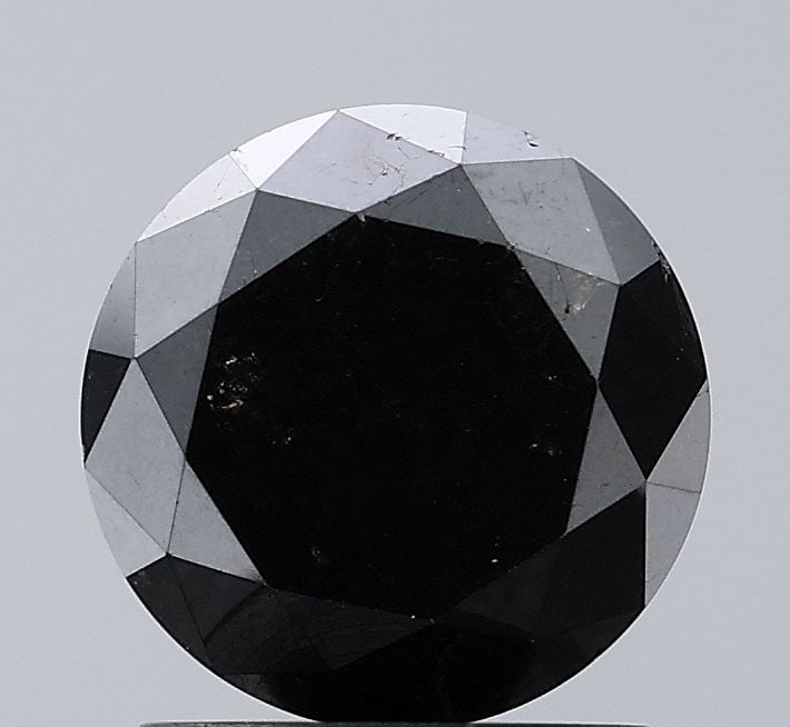 Round 1.89ct Black VVS2 - Loose Natural Diamond: Round 1.89ct Black VVS2 - Loose Natural Diamond Round 1.89ct Black VVS2 - Loose Natural Diamond. This exceptional diamond boasts a rare black color, exceptional clarity, and impressive polish, making
