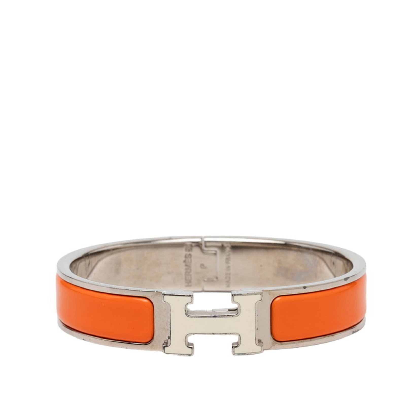 HERMES Charm Bracelet Metal: HERMES Charm Bracelet Metal Ivory, Orange, Silver Charm Bracelet from Hermes Features a mix of metal colors and a unique charm design, adding visual interest to any outfit. The 15.5cm length provides 