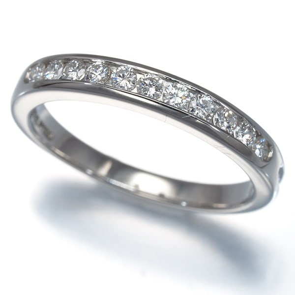 Tiffany&Co. Ring Diamond Wedding Band Channel Set Half Eternity Pt 950: Tiffany&Co. Ring Diamond Wedding Band Channel Set Half Eternity Pt 950 Tiffany & Co.'s platinum diamond channel set wedding band boasts a natural diamond, set in a classic design. The 950 platinum met