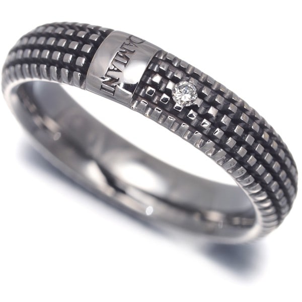Damiani Ring Diamond Metropolitan Us7.25 18K 750 White Gold: Damiani Ring Diamond Metropolitan Us7.25 18K 750 White Gold 18K white gold, weighing 4.6g, forms the foundation of this elegant Metropolitan ring, featuring a natural diamond at its center. The