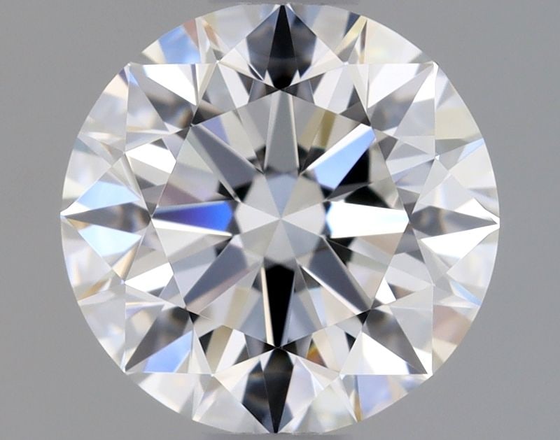 GIA Round 0.9ct E VVS2 - Loose Natural Diamond: GIA Round 0.9ct E VVS2 - Loose Natural Diamond GIA Round 0.9ct E VVS2 - Loose Natural Diamond. This 0.9ct round diamond boasts exceptional clarity, color, and cut, with a VVS2 grade indicating