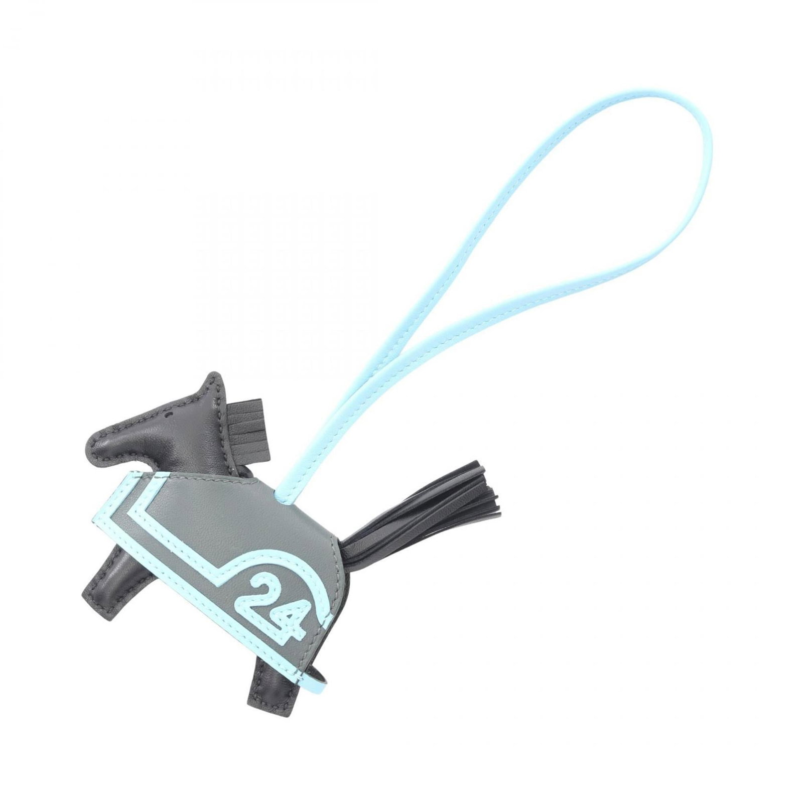 HERMES Handbag Charm Agneau Milo: HERMES Handbag Charm Agneau Milo Agneau Milo is a signature material used by Herm?s, known for its exceptional quality and durability. This handbag charm showcases the intricate design and craftsmansh