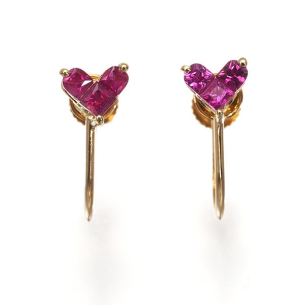 Ruby 0.20Ct/0.20Ct Heart Earrings 18K 750 Yellow Gold: Ruby 0.20Ct/0.20Ct Heart Earrings 18K 750 Yellow Gold The 18K yellow gold heart earrings showcase two natural rubies, each weighing 0.20ct, suspended from a delicate clip-on design. The 4.7 x 5.2mm ru