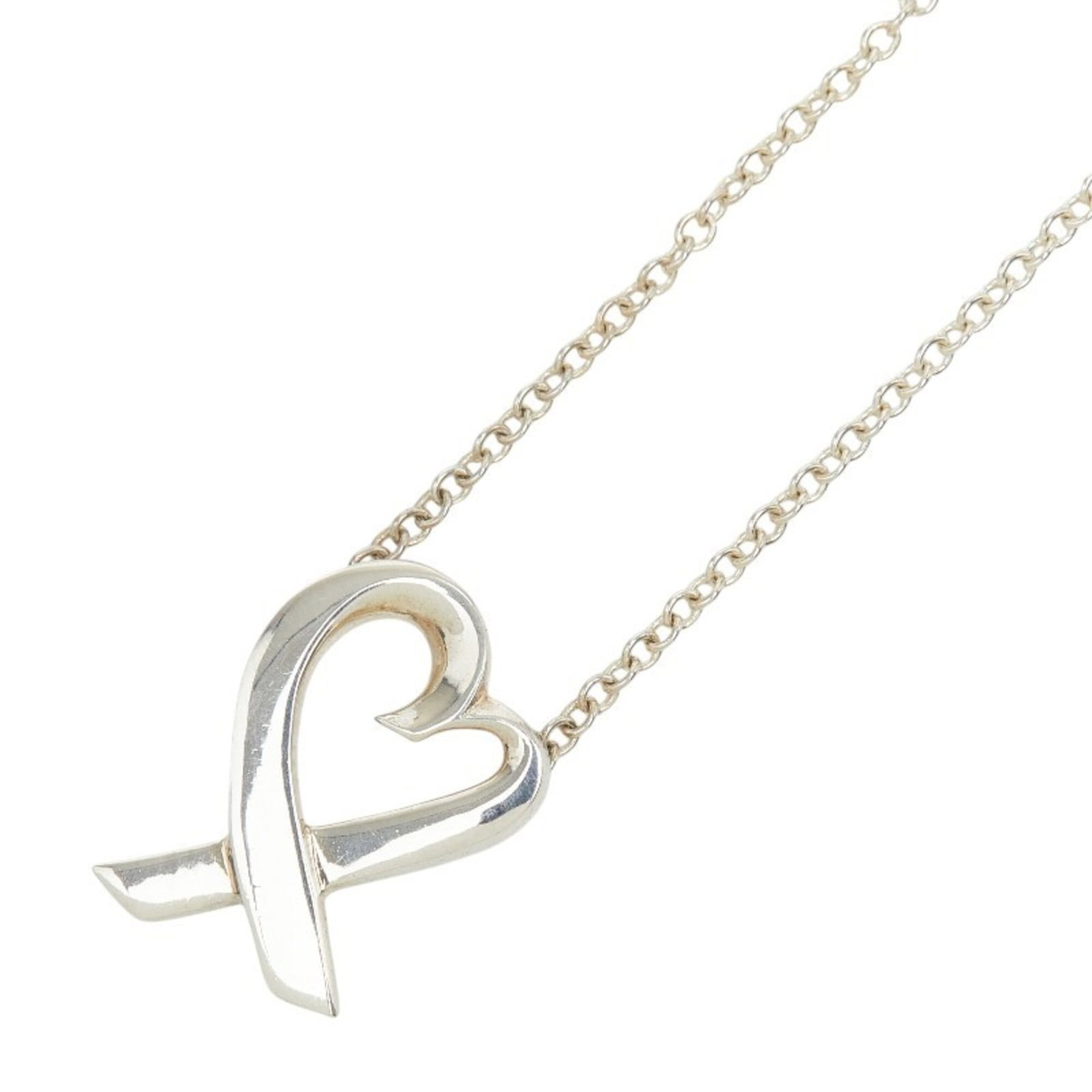 TIFFANY Silver Silver 925: TIFFANY Silver Silver 925 Silver 925 Tiffany necklace with a 14.3mm x 10.5mm pendant, set in a necklace with a 41.5 cm circumference, bearing a visible silver 925 hallmark. This necklace has scratches