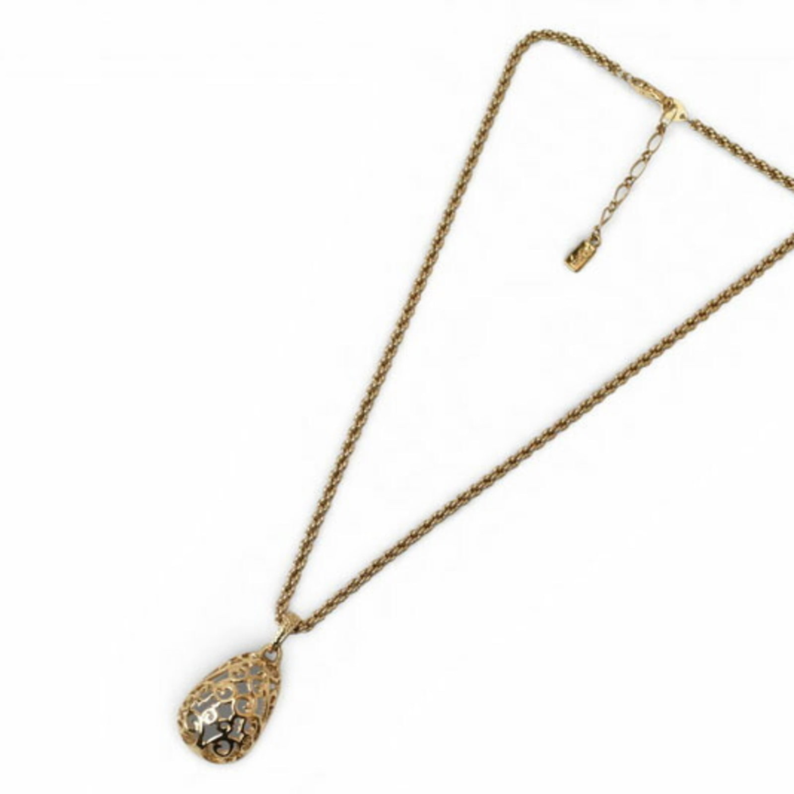 YVES SAINT LAURENT Gold: YVES SAINT LAURENT Gold Gold Yves Saint Laurent Necklace, a statement piece with a 36mm x 22mm gold pendant, available in a 46-52cm adjustable chain. The necklace bears a signature, adding a touch of