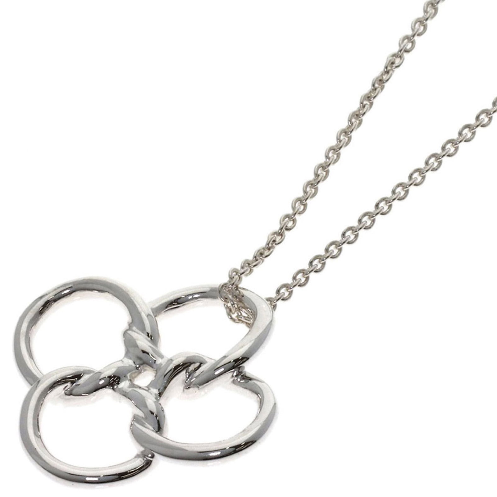 TIFFANY Silver Necklace: TIFFANY Silver Necklace Silver necklace from Tiffany, featuring a 27.6mm x 27.9mm pendant, is available for purchase. This gently used piece boasts a 40 cm circumference, with minor signs of wear and 