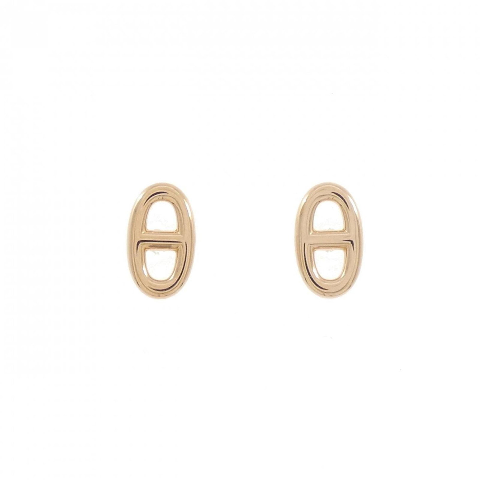 HERMES Stud Earrings Pink Gold (18K): HERMES Stud Earrings Pink Gold (18K) Pink gold (18K) stud earrings from Hermes, featuring a delicate design. Gently used with minor signs of wear, these earrings showcase a subtle pink gold tone. In v