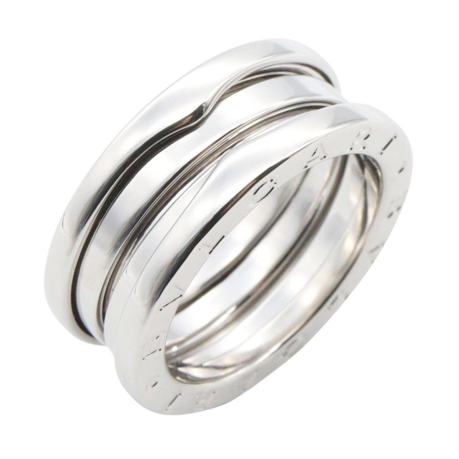 BVLGARI Band Ring White Gold (18K): BVLGARI Band Ring White Gold (18K) Bvlgari Band Ring White Gold (18K) is a sleek and sophisticated accessory featuring 18K white gold construction. This band ring boasts a classic design that suits