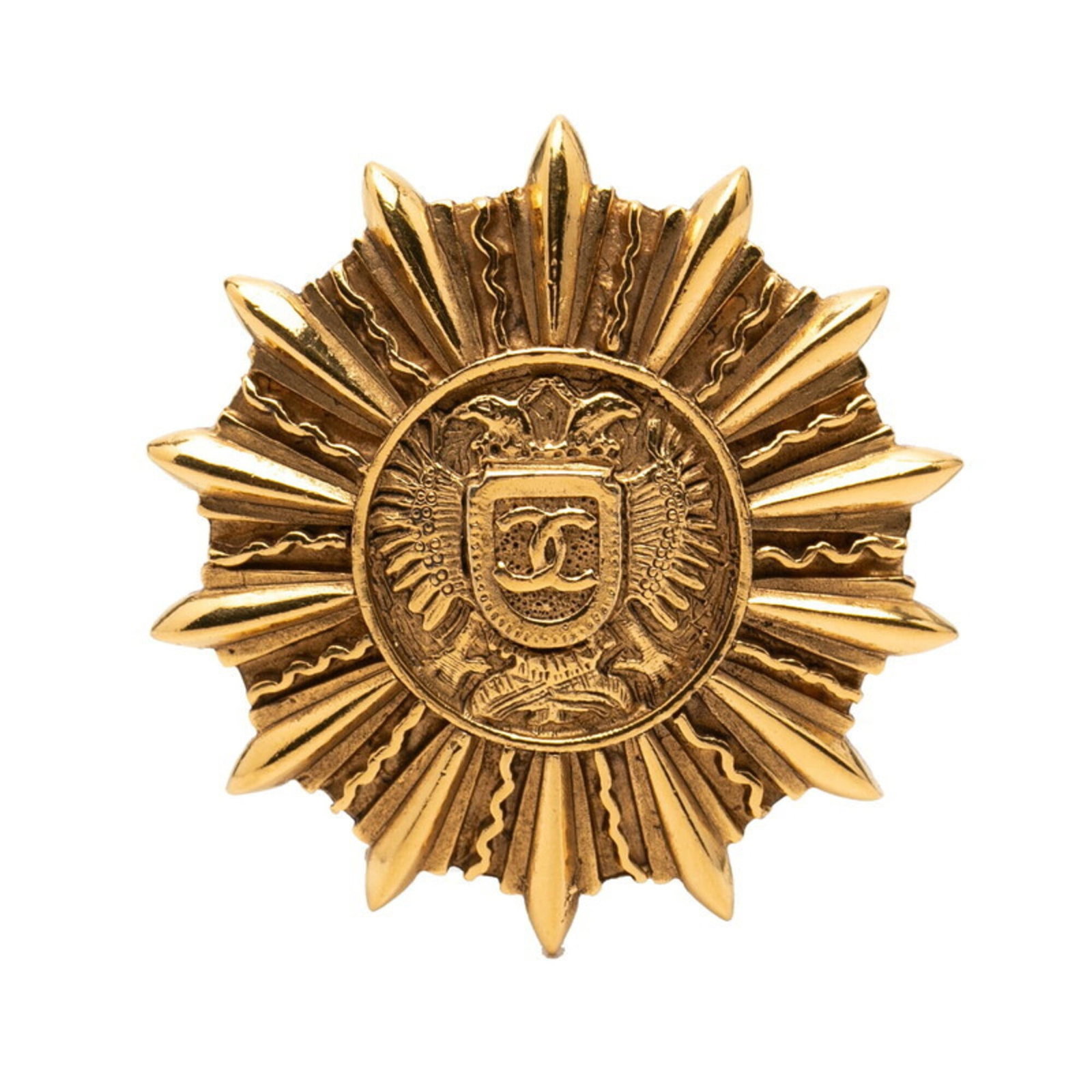 CHANEL Brooch Gold Plating: CHANEL Brooch Gold Plating Gold-plated by the iconic French fashion house, this CHANEL brooch boasts elegant design and sophisticated charm. Measuring 45cm x 45.7cm, it features a subtle gold plating